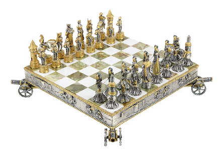 Giuseppe Vasari gilt metal chess set and board,  circa: Giuseppe Vasari gilt metal chess set and board, circa 1965-1970, the fiugral pieces depicting the armies of France and Spain, complete with 32 pieces, with a metal mounted onyx chess board rising on c