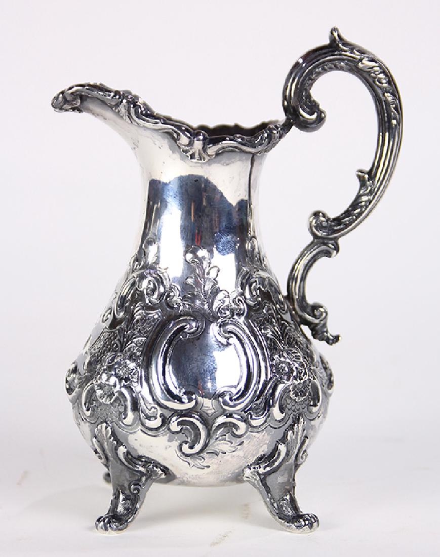 English William Hunter sterling silver cream pitcher, (1 of 2)