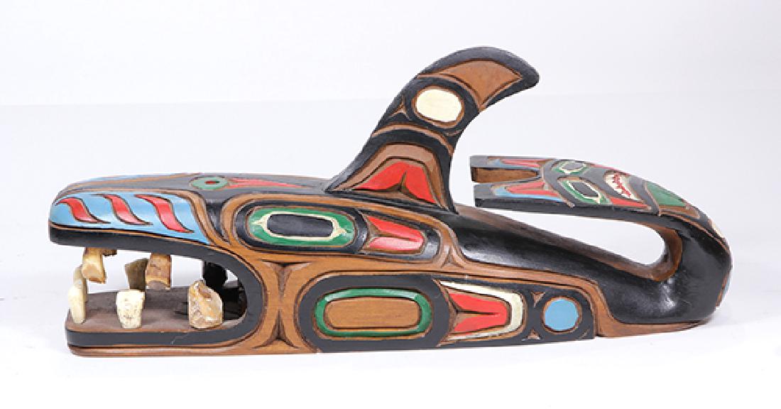 Pacific Northwest wood carved and polychrome decorated: Pacific Northwest wood carved and polychrome decorated sculpture by Gary Rice, entitled "Jonah and The Whale", artist signature incised on underside of base, 7"h x 4"w x 15"d
