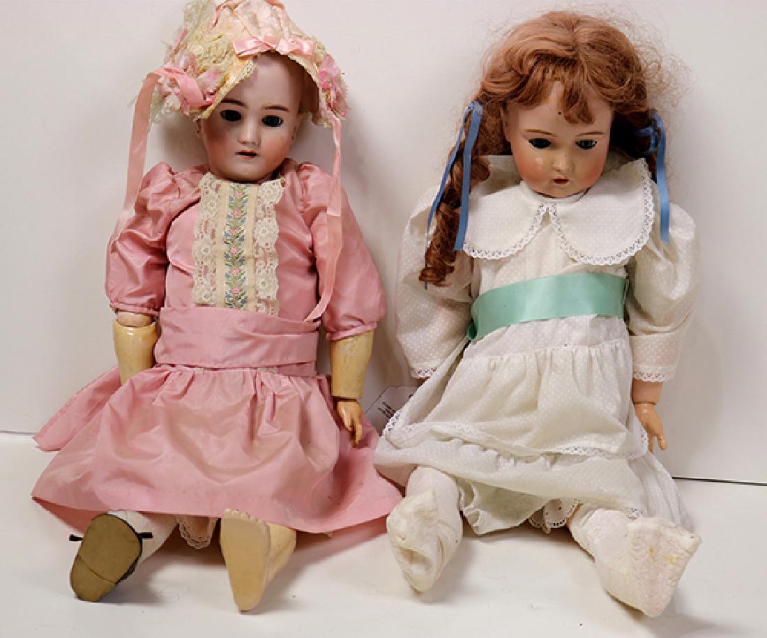 (lot of 5) Porcelain bisque head doll group: (lot of 5) Porcelain bisque head doll group, each with glass eyes, open mouths revealing visible teeth, composite articulated bodies, all dressed in period attire, including (2) Simon and Halbig, othe