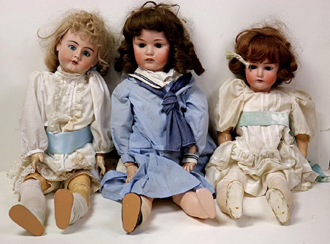 (lot of 5) Porcelain bisque head doll group: (lot of 5) Porcelain bisque head doll group, each with composite articulated bodies, glass eyes, open mouths with visible teeth, in period attire, makers include J.D. Kestner, Simon & Halbig, DEP, lar