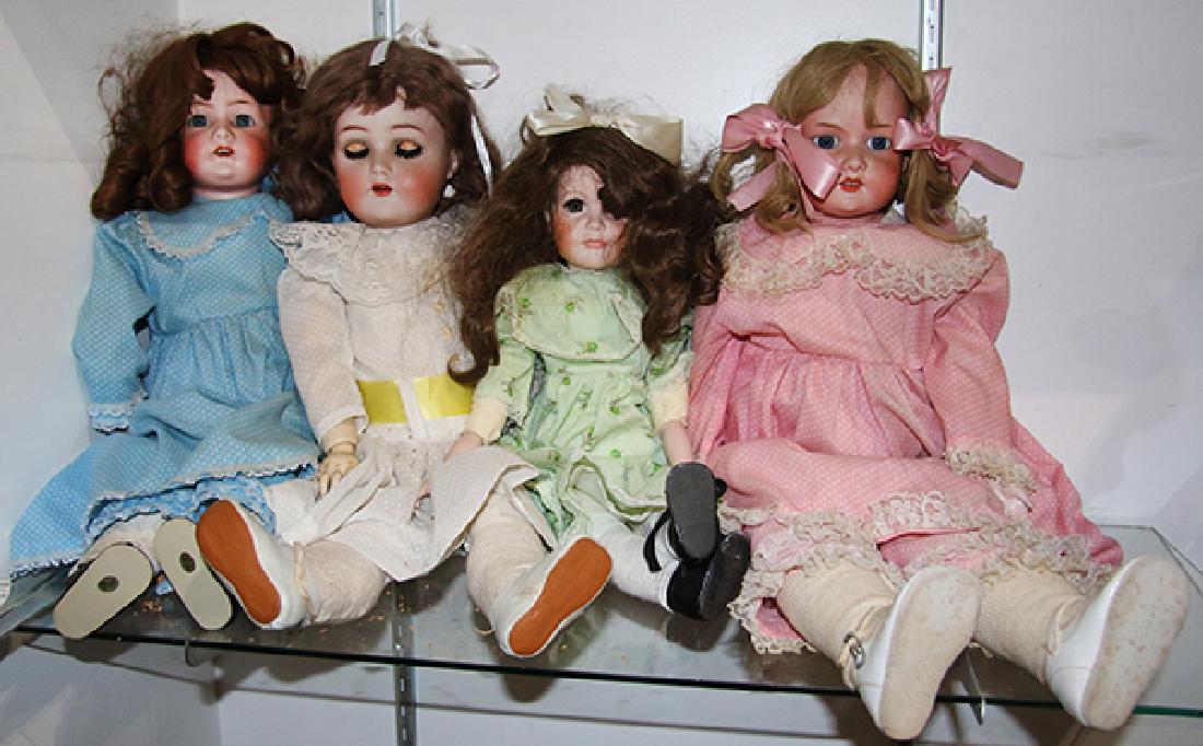 (lot of 4) Porcelain bisque head doll group (1 of 1)