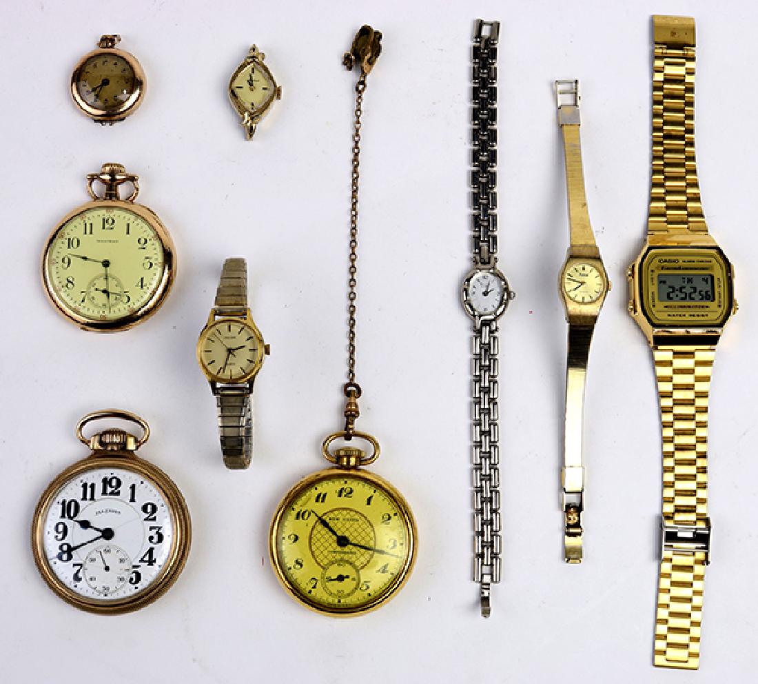 (Lot of 9) Gold-filled and metal watches: (Lot of 9) Gold-filled and metal watches comprised of one gold-filled Illinois open face pocket watch; one gold-filled Waltham open face pocket watch; one metal New Haven open face pocket watch with m
