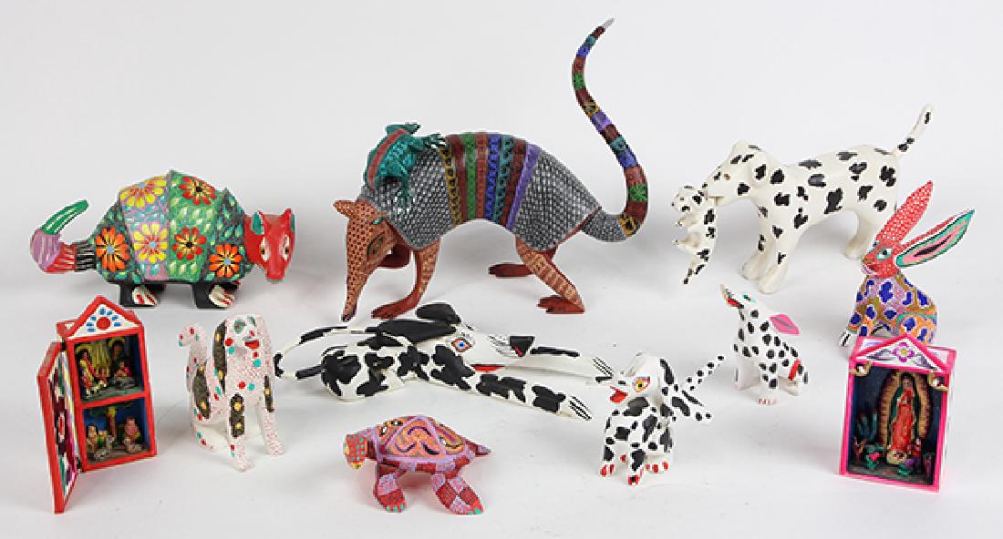 (lot of 11) Oaxaca style folk art group, carved and (1 of 3)