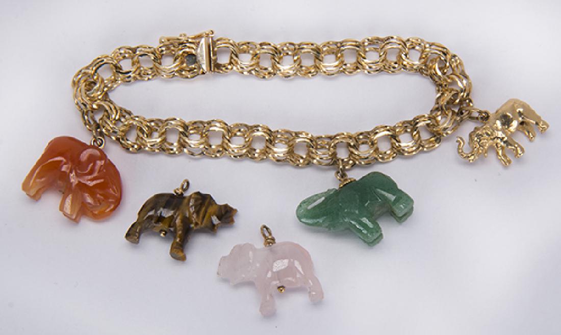Multi-stone, 14k yellow gold charm elephant bracelet (1 of 5)