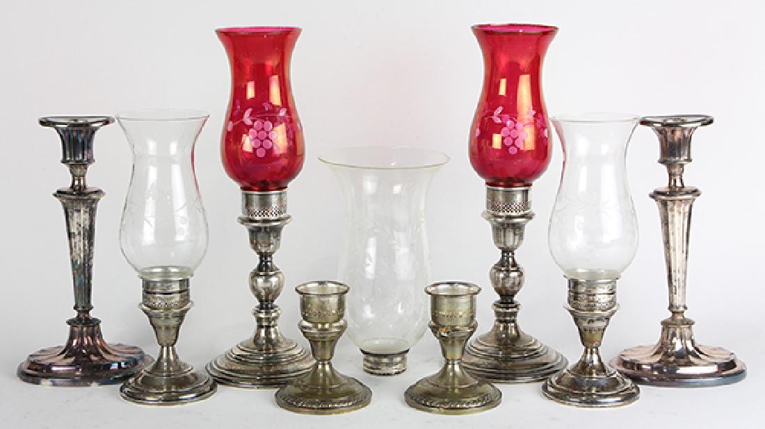 (lot of 11) Sterling weighted candlestick group, (1 of 2)