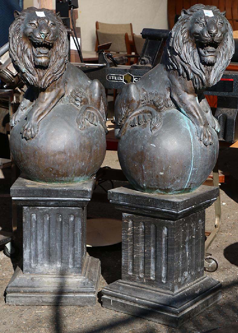 Pair of cast bronze lions statues (1 of 2)