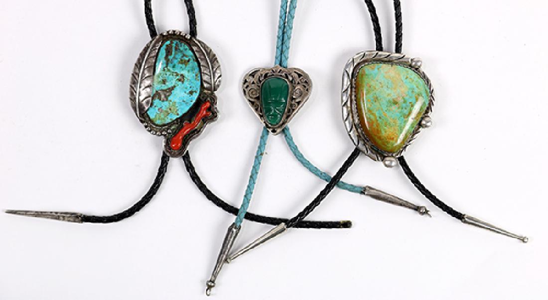 (Lot of 3) Turquoise, coral, chalcedony and silver bolo: (Lot of 3) Turquoise, coral, chalcedony and silver bolo ties comprised of one turquoise, branch coral, silver and leather bolo tie (one silver tip missing); one turquoise, sterling silver and leather