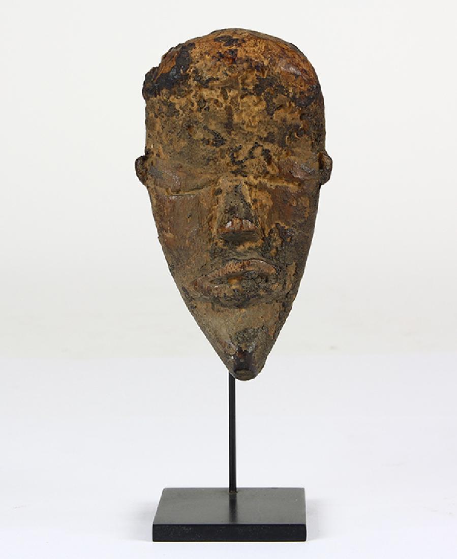 Maskette commonly referred to as a passport mask (1 of 5)