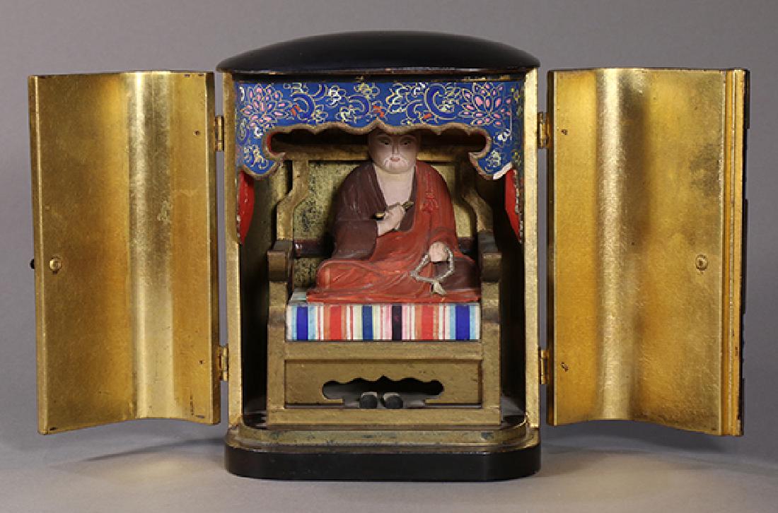 Japanese Zushi with Kukai: Japanese zushi (traveling Buddhist shrine), with wooden seated Kukai (Japanese, 774 -835), in black laquered case, overall (case) approx. : 6.75"h x 5"l x 4"d