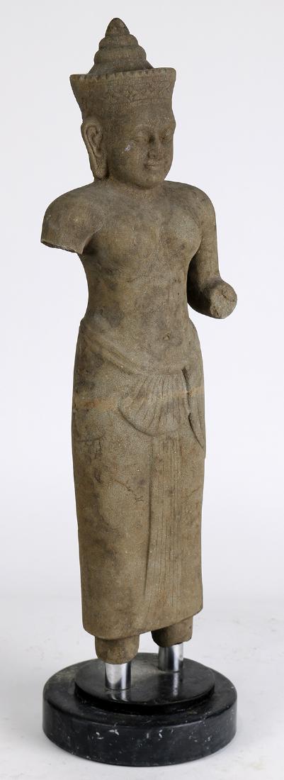 Cambodian style Stone Deity: Cambodian style stone sculpture, the male deity with a nude torso and dohti draping to the lower body, with stand, overall: 21.5"h