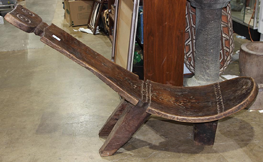 Ethnographic carved wood chair, having a zoomorphic (1 of 3)