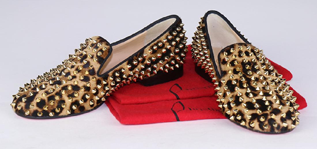 Pair of Christian Louboutin Leopard Rolling Pony Luxor: Pair of Christian Louboutin Leopard Rolling Pony Luxor Studded Loafers, size 37.5