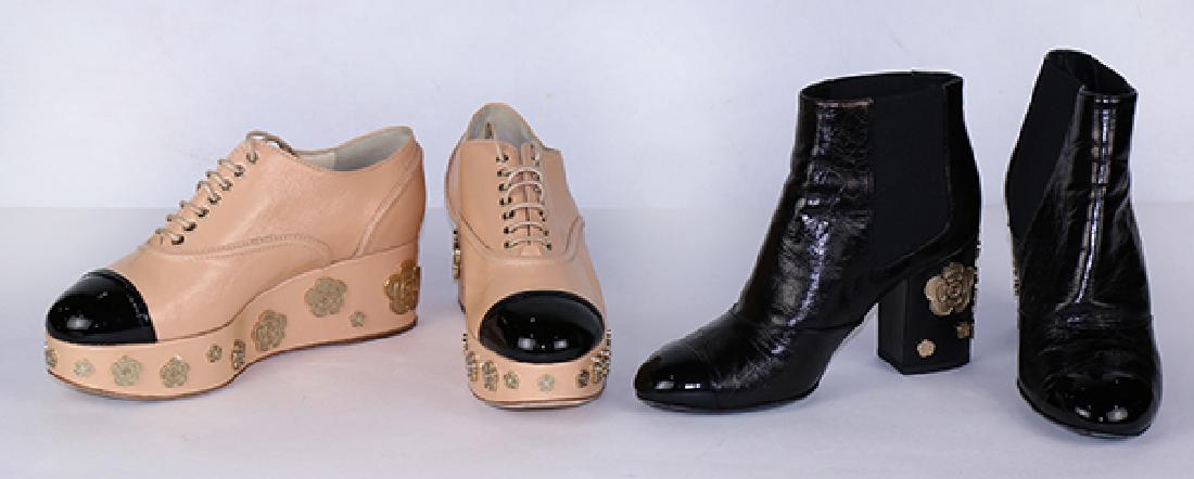 Two pair of Chanel Camellia shoes, consisting of a pair: (lot of 4) Two pair of Chanel Camellia shoes, consisting of a pair of nude platform lace up Oxfords, size 38; together with a pair of black mid-heel boots, size 37C