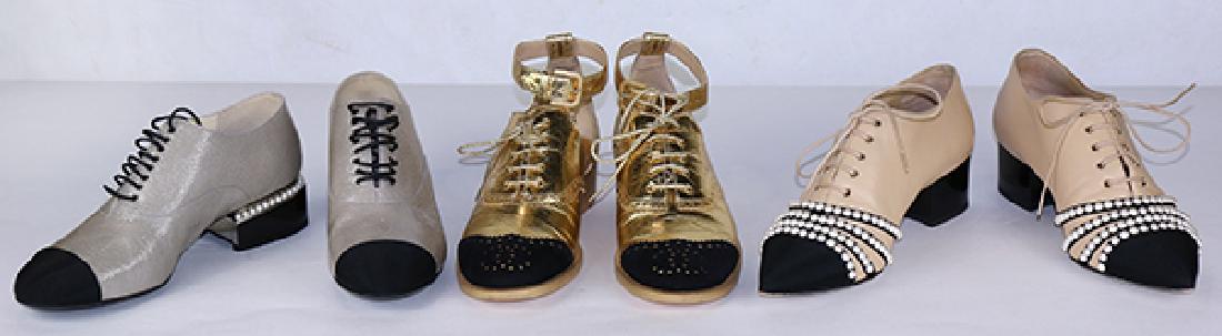 Three pairs of Chanel oxfords, consisting of a pair of: (lot of 6) Three pairs of Chanel oxfords, consisting of a pair of nude patent leather lace up shoes with pearl heels, size 37.5; a pair of gold leather and black suede shoes with ankle strap and lace 