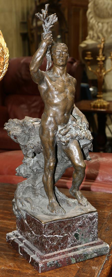 Patinated bronze figural sculpture: Patinated bronze figural sculpture, modeled as a nude male, depicted holding leaves in his right arm, and rising on a stepped marble base, 20.5"h x 6.5"w x 6.5"d