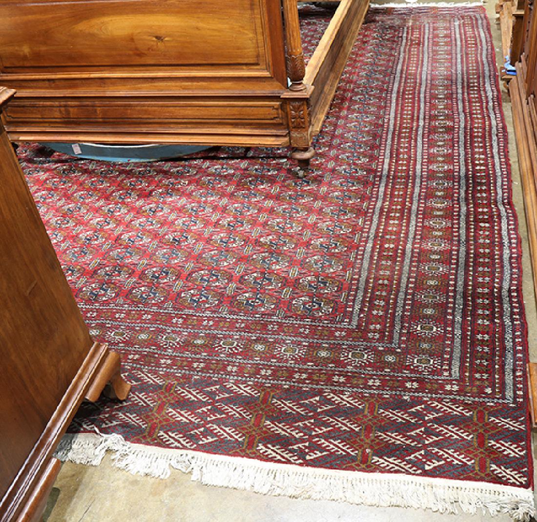 Pakistani Bokhara carpet, 12' x 9'4" Property from the (1 of 2)