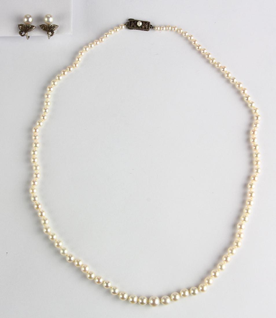 Mikimoto cultured pearl and sterling silver jewelry: Mikimoto cultured pearl and sterling silver jewelry suite comprised of one necklace, featuring (97) graduating cultured pearl's, ranging in size from approximately 6.7 to 3.2 mm, completed by a cultur