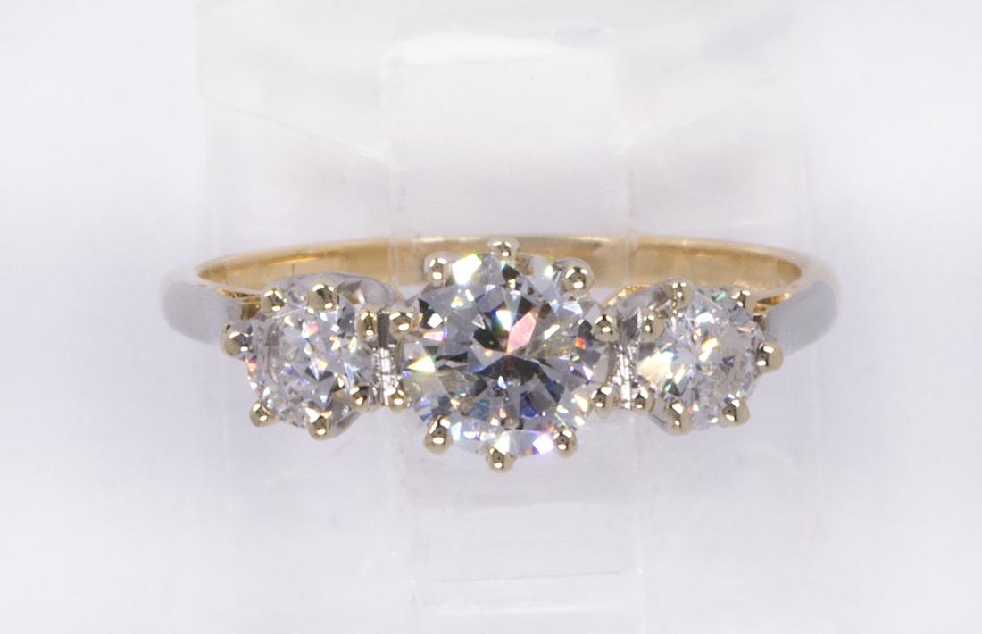 Diamond and 14K gold ring: Diamond and 14K gold ringcentering (1) round brilliant-cut diamond, weighing approximately 0.45 ct., flanked by (2) round brilliant-cut diamonds, weighing a total of approximately 0.30 ct., set in a 1