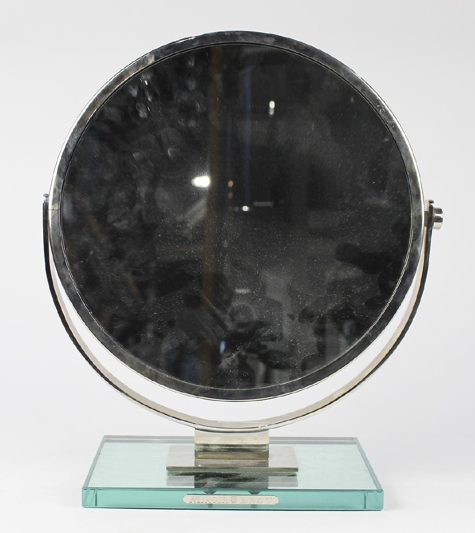Miroir Brot French Art Deco style vanity mirror, the: Miroir Brot French Art Deco style vanity mirror, the round double sided mirror mounted on a rectangular glass base, 16.5"h x 14.5" w x 7"d