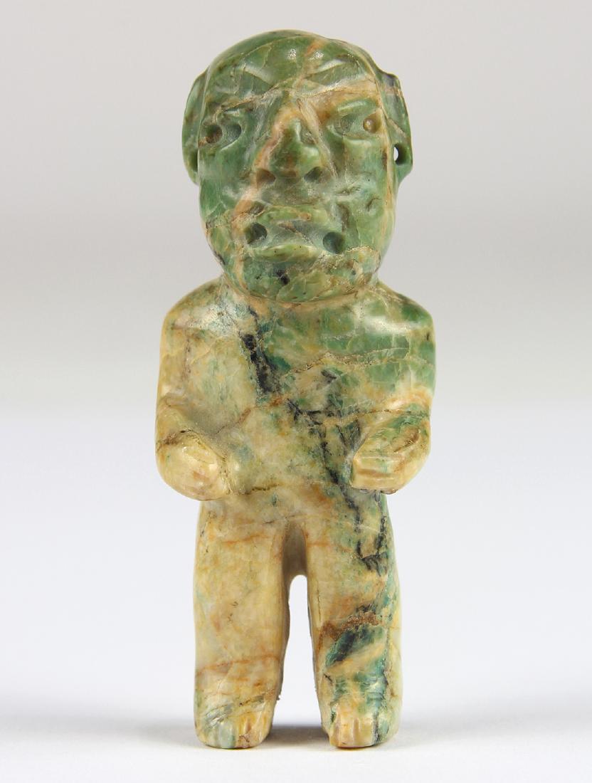An Olmec or Olmec-style green jadeite figurine, (1 of 9)