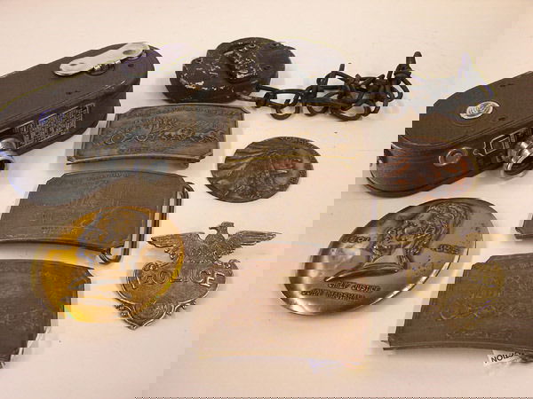 Tiffany New York signed bronze buckles, vintage c: Vintage Keystone Mfg. Co. 8mm camera together with a group of bronze belt buckles signed Tiffany New York, old lock on chain, etc.