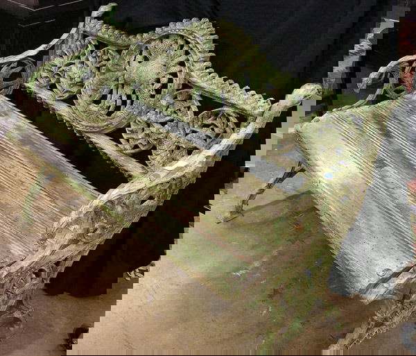 Cast iron railway bench: Cast iron garden bench with a camel medallion