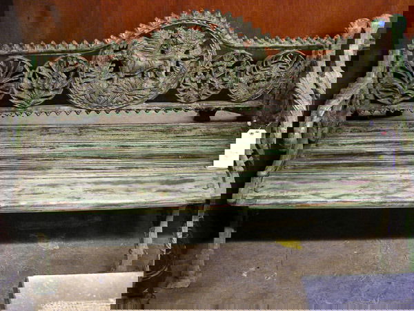 Cast iron railway bench: Cast iron and wood garden bench with a hunting dog medallion