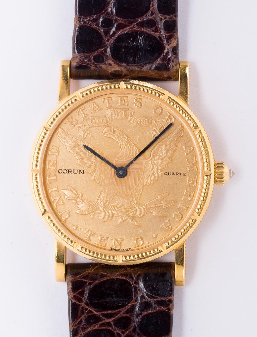 Corum coin form, 18k yellow gold midsize wristwatch: Corum coin form, 18k yellow gold midsize wristwatch Dial: US $10 gold coin, black baton hands, Quartz, Corum, Swiss Made Movement: 6 jewels, unadjusted, quartz, V8 Corum, 221234, Swiss Corum, 750, 18K