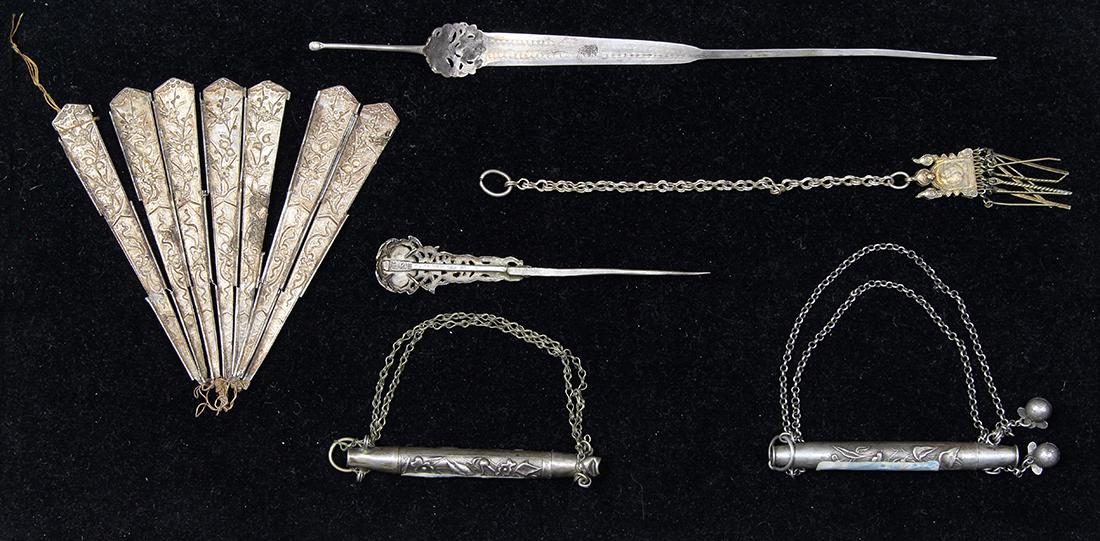 Chinese Miscellaneous Silver Articles: (lot of 6) Chinese silver miscellaneous items, consisting of a fan with prunus and treasures; two small cylindrical needle cases; a chatelaine with a compass; together with two hairpins, largest hairp