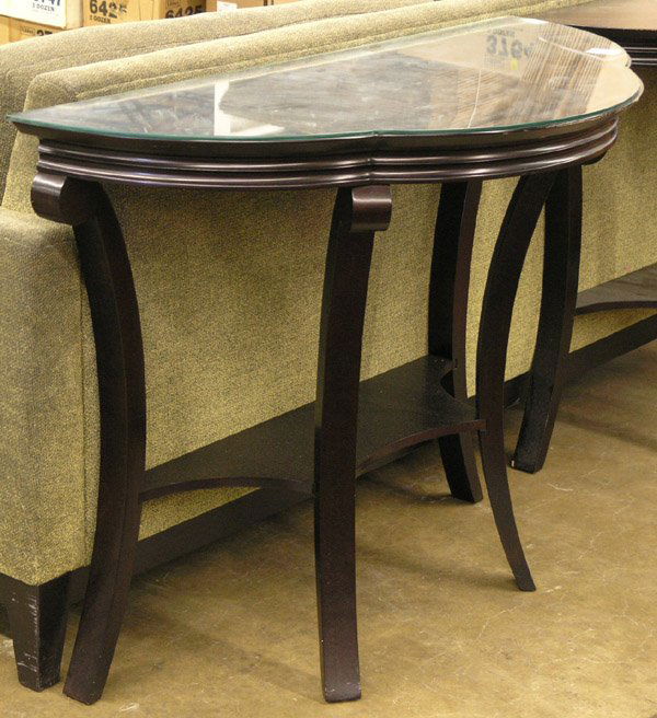 Pier tables: Pair of two tier pier tables with shaped top, one lacking glass, 44''w x 32.5''h. This lot is being sold to benefit the World Trade Club of San Francisco and is not subject to buyer's premium.