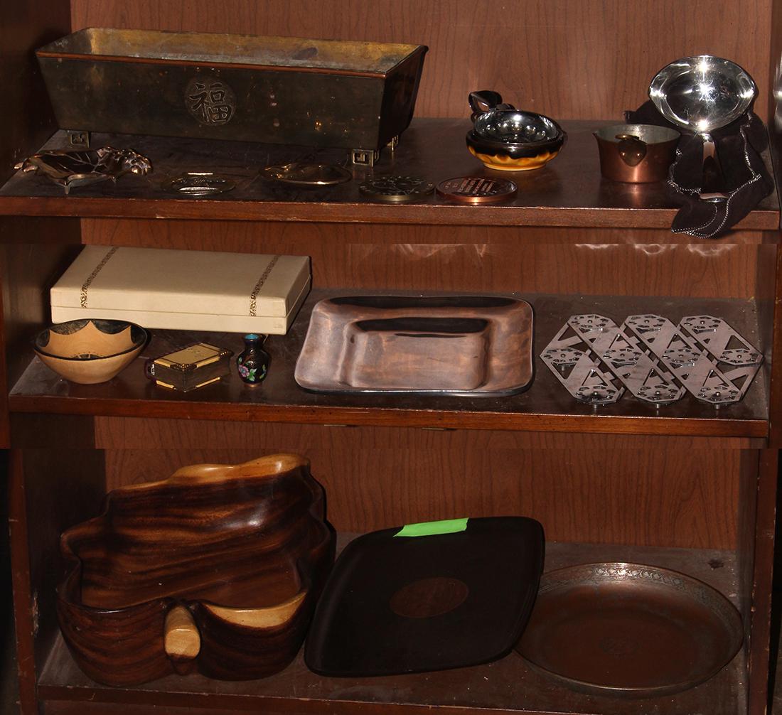 Three shelves of decorative art including a Hawaiian (1 of 4)