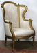 Louis XV style giltwood carved wing back bergere, - 2
