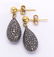 Pair of diamond, blackened silver and 14k yellow gold