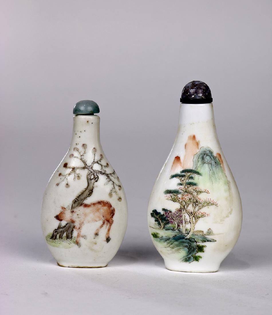 Chinese Porcelain Snuff Bottles: (lot of 2) Chinese enameled porcelain snuff bottles, each with a flattened pear shaped body, one depicting a landscape; one showing a boy on ox, 3"h