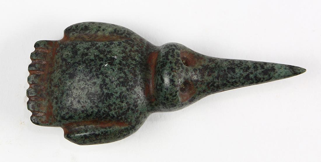 Pre-Columbian carved stone figural whistle (1 of 2)