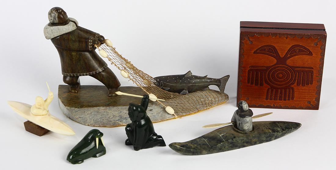 (lot of 5) Inuit carved soapstone and bone figural: (lot of 5) Inuit carved soapstone and bone figural groups, including two smaller figurines, one depicting a walrus, another a hunter, one of bone depicting a hunter in a canoe, and another hunter in a