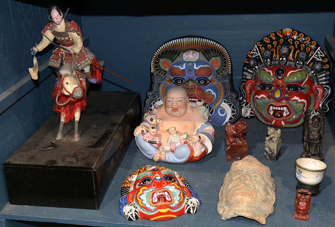 One bin of decorative Asian art, including a figural (1 of 1)