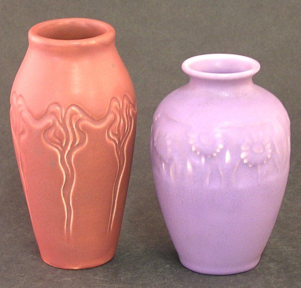 Rookwood commercial pottery vases: (Lot of 2) Rookwood commercial pottery vase in lavendar mat with carved sunflowers at shoulder, dated 1930, 5.25''h; and a Rookwood commercial pottery vase in crimson mat, dated 1904, 6''h