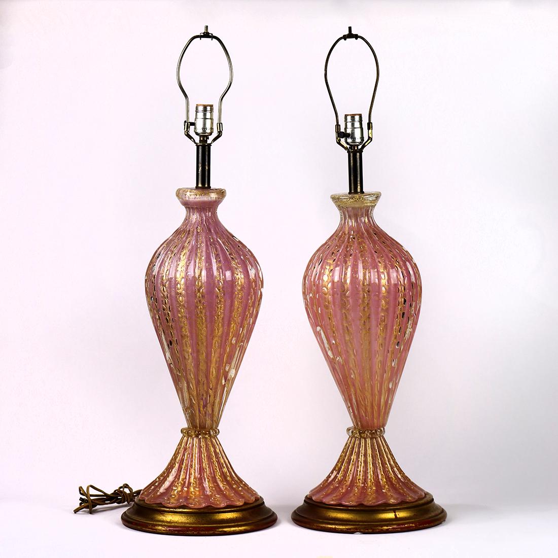 Murano Barovier and Toso pair of lamps: Murano Barovier and Toso pair of lamps, each having a single light, above the tapered form executed in pink with gilt inclusions and rising on a circular base, 33.5"h