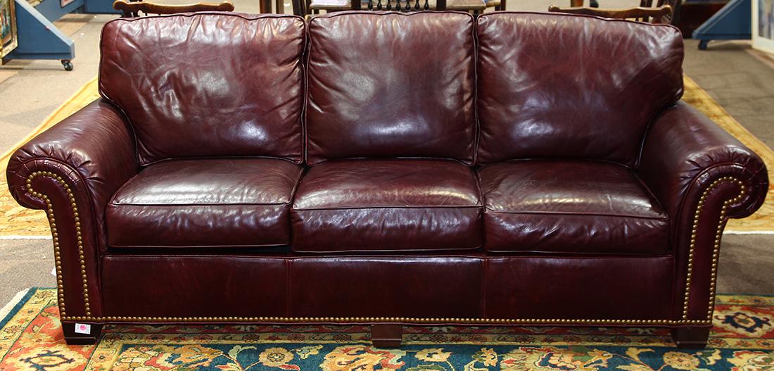 Contemporary Whittemore-Sherrill leather sofa: Contemporary Whittemore-Sherrill leather sofa, the three seat sofa with arms and frame having nail head accents, 36"h x 90"l x 35"d