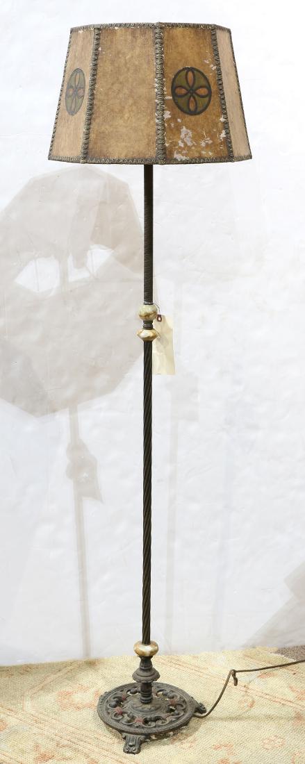 Arts and Crafts floor lamp: Arts and Crafts floor lamp, having a mica shade decorated with stylized quatrefoil medallions, continuing to the patinated metal base with onyx accents, 60"h