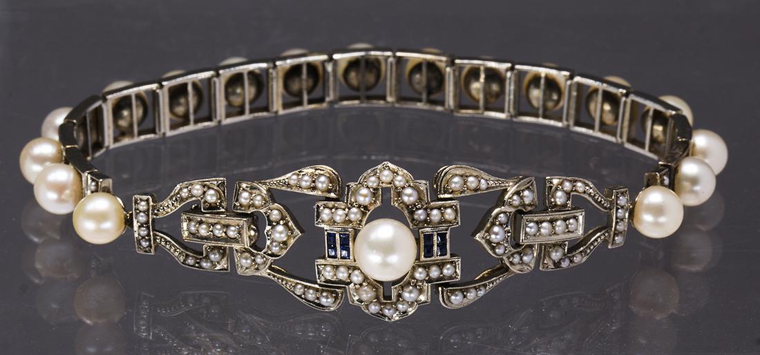 Mikimoto cultured pearl, synthetic sapphire and 18k: Mikimoto cultured pearl, synthetic sapphire and 18k white gold bracelet Featuring (18) 6.0 and 5.0 mm cultured pearls, accented by (84) graduating seed pearls, enhanced by (8) square-cut synthetic sap