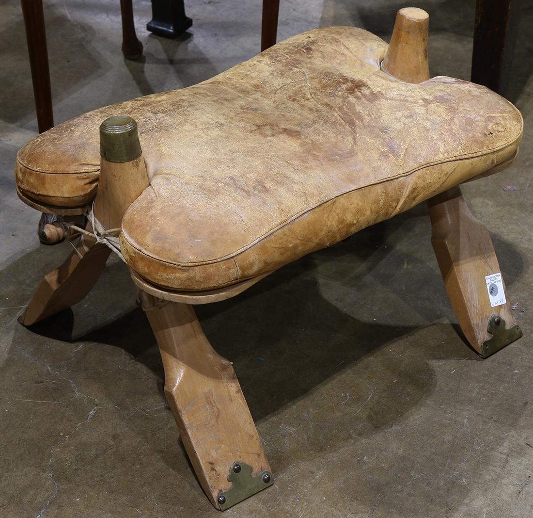 Camel  saddle, having an upholstered leather seat, 17"h (1 of 1)