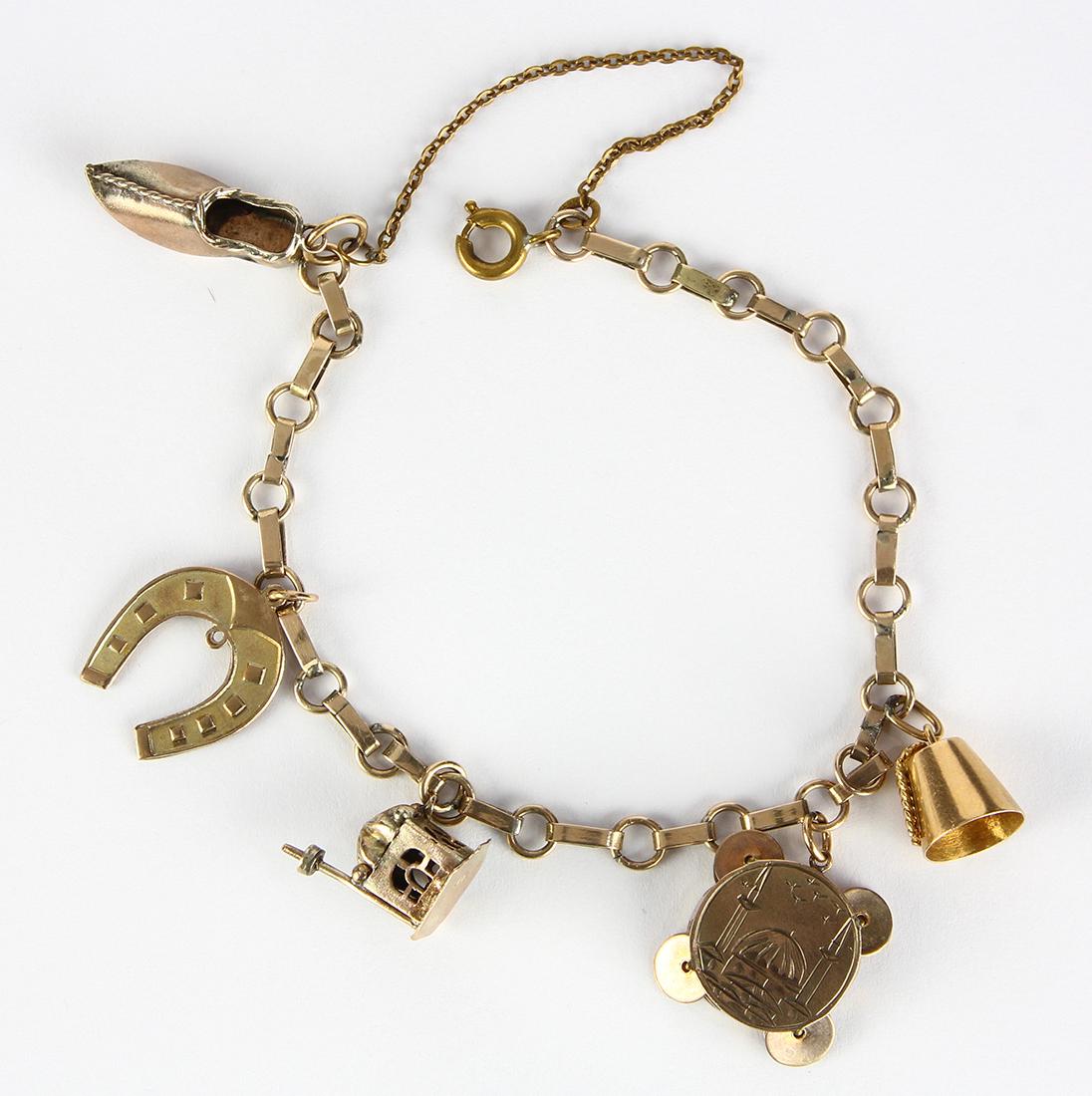 Yellow gold charm bracelet (1 of 2)