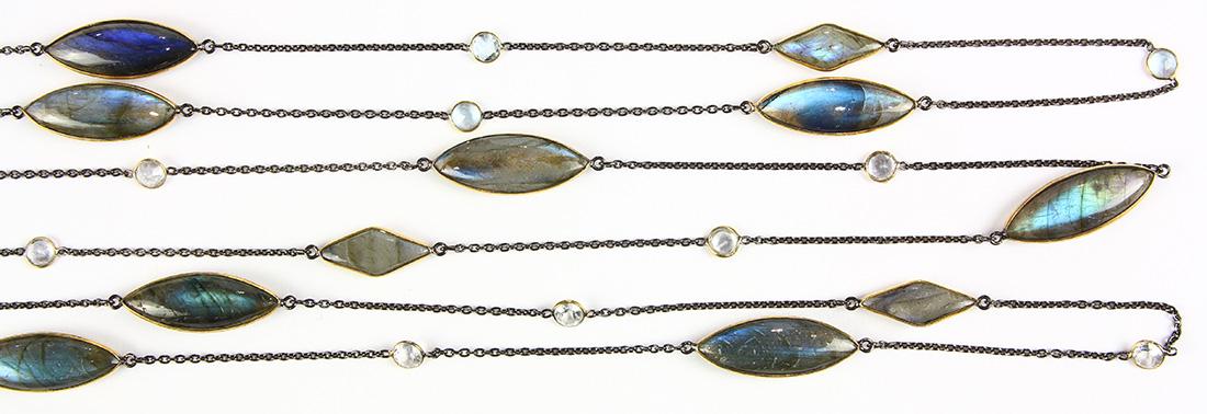 (Lot of 3) Labradorite, colorless topaz, blackened and: (Lot of 3) Labradorite, colorless topaz, blackened and gilt silver necklaces Each necklace features (5) navette and (3) lens-shaped double labradorite cabochons, ranging in size from approximately 29