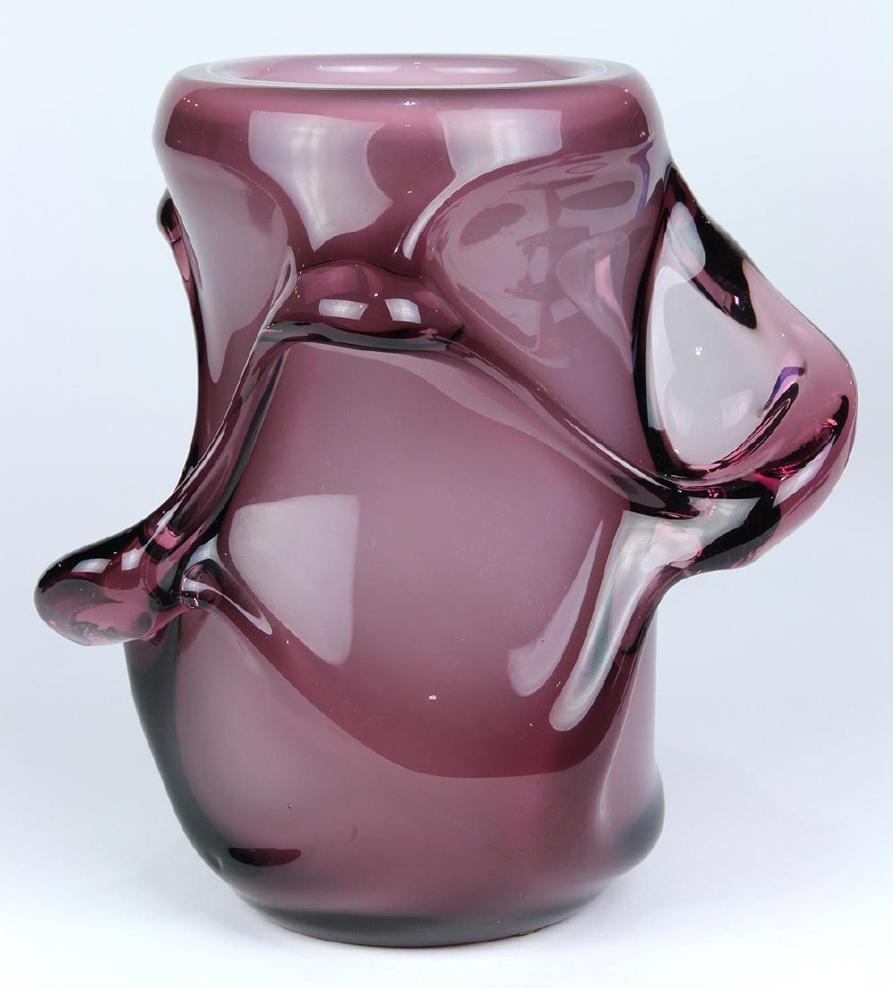 Flavio Poli for Seguso Verti d'Arte "Freeform" series: Flavio Poli for Seguso Verti d'Arte "Freeform" series vase, circa 1937, executed in aubergine cased in a clear "free form" layer, unsigned, 10"h. Literature: Marc Heiremans, "Seguso Vetri d'Arte: Glas