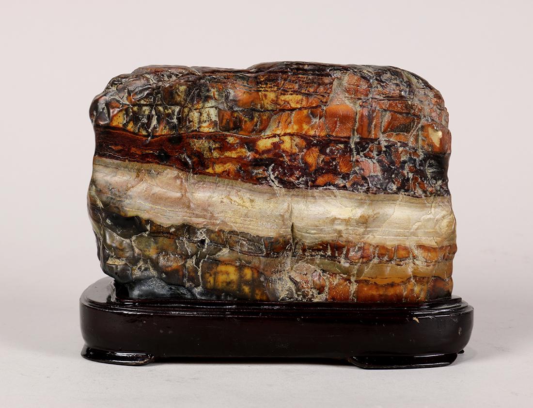 Chinese Scholar's Rock, Pork Belly: Chinese scholar's rock, reminiscent of a cooked pork belly, with layers of mottled brown and tan hue, with stand, 7.5"w
