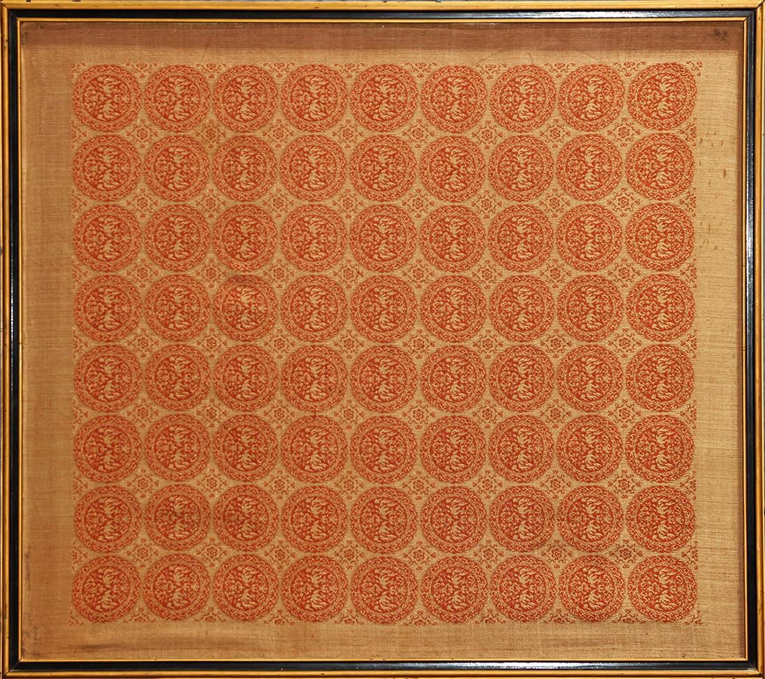 Framed textile fragment of red phoenix roundels (1 of 1)