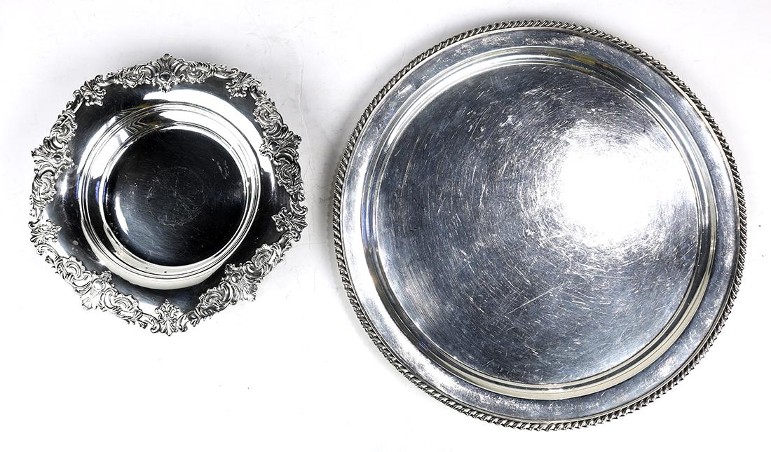 (lot of 2) American Shreve and Co. sterling silver: (lot of 2) American Shreve and Co. sterling silver table articles, consisting of a round serving tray with gadrooned rim, together with a footed wine bottle coaster, largest; 12"dia., 12.49 troy oz.